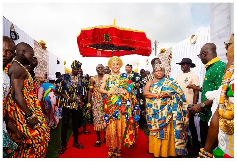 Traditional Ghanaian ceremony under a royal umbrella