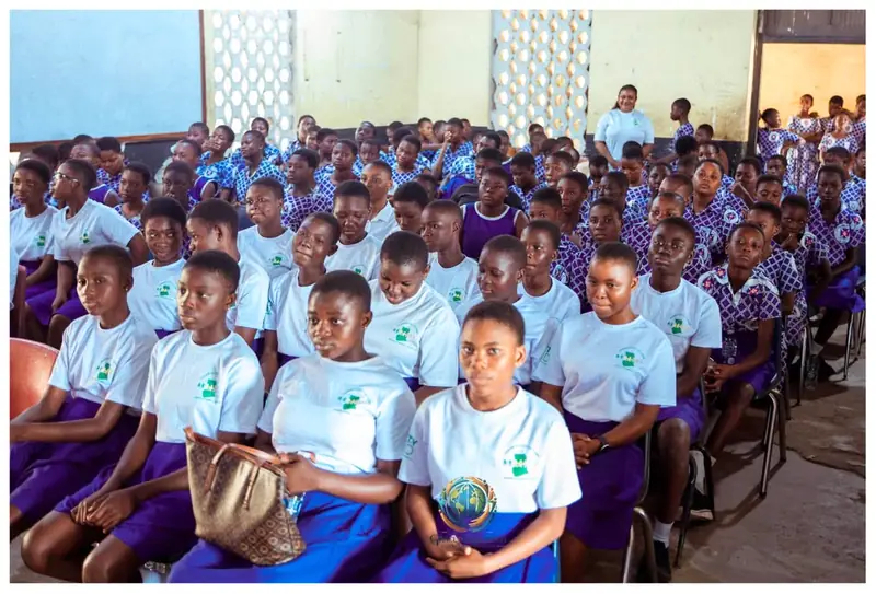 Students gathered for a community program in Ghana