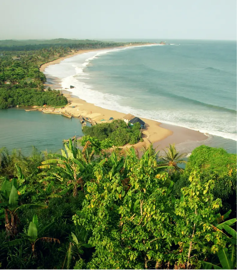 Ghana coastline with golden beaches and rainforest